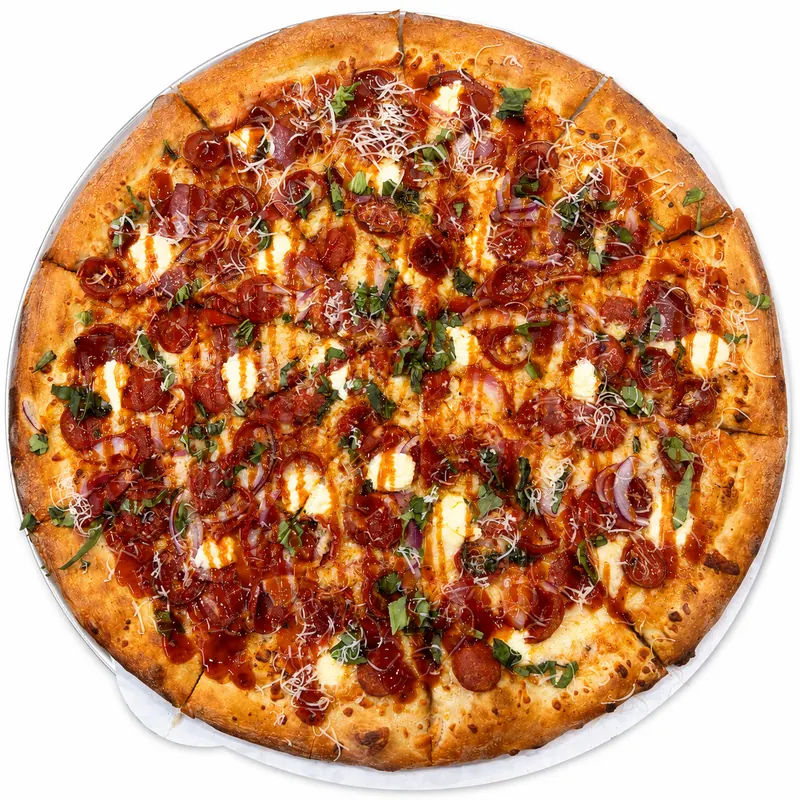 Hot Peach Summer pizza with spicy peach sauce, pepperoni, salami and ricotta